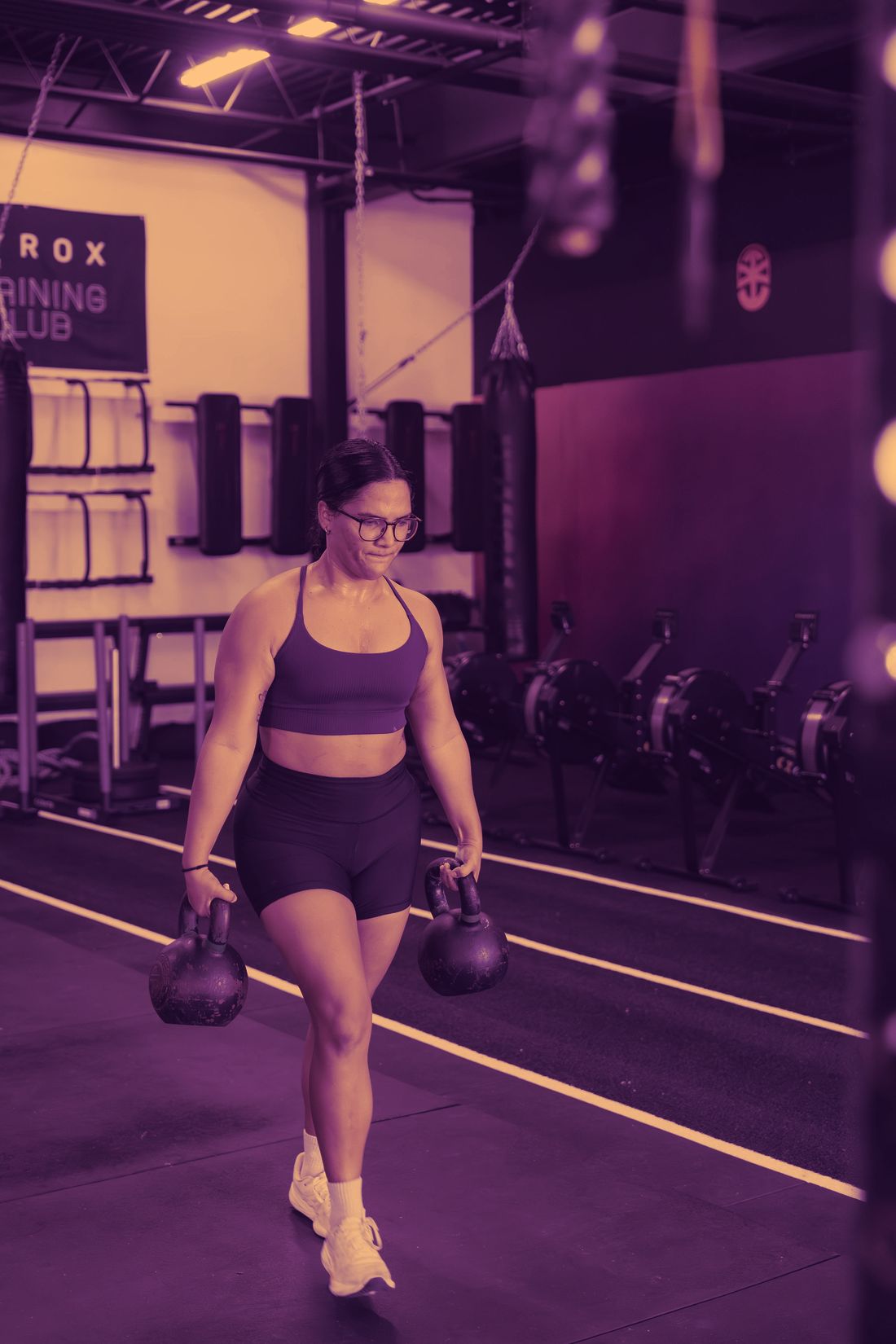 RFC athlete mid farmers carry on the HYROX race lanes
