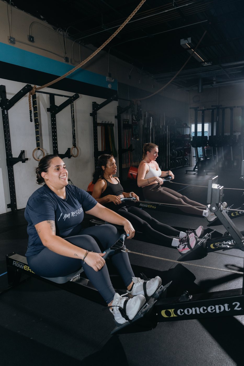 RFC members rowing together during a class