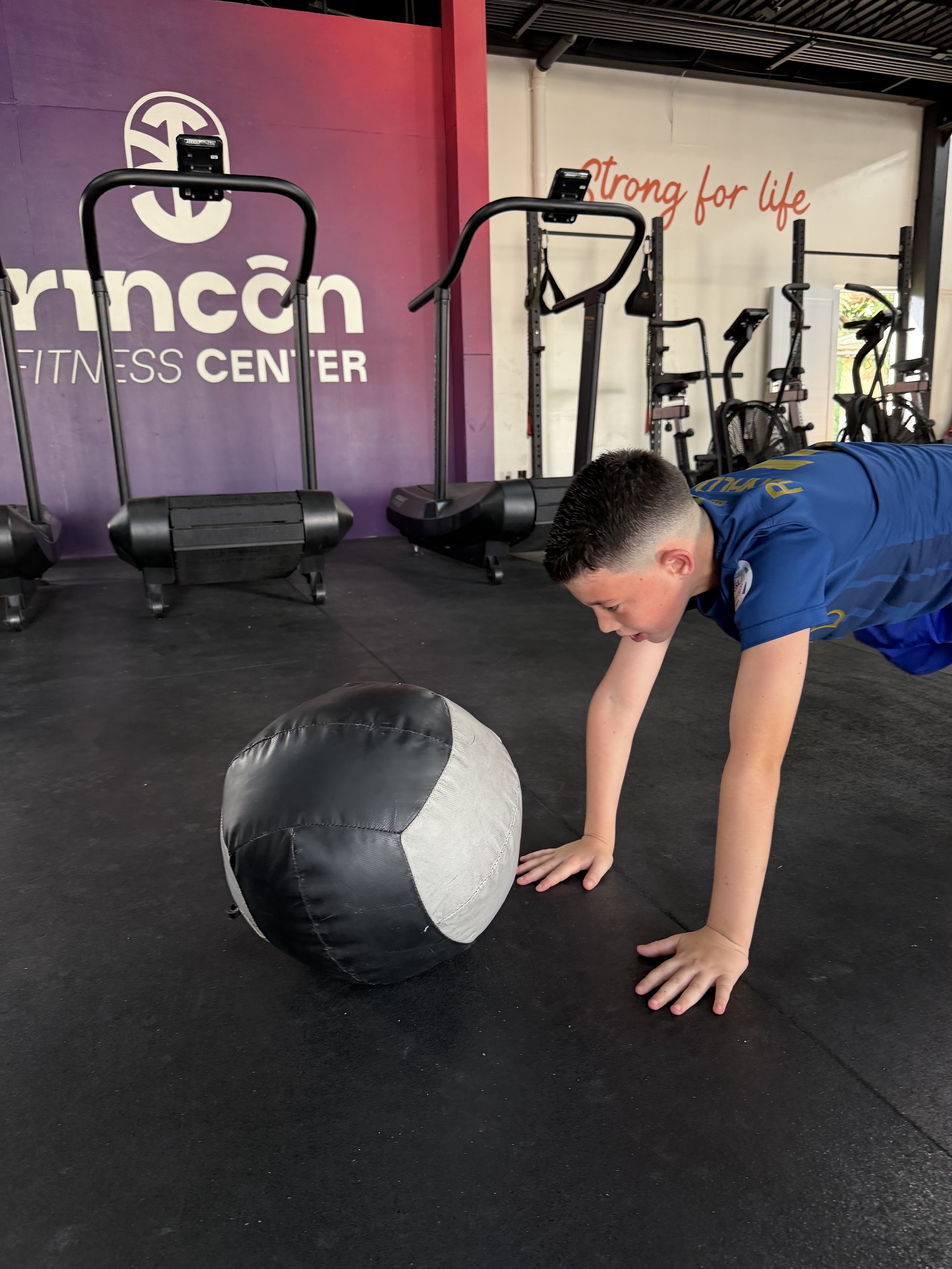 Young athlete training with medicine ball at RFC